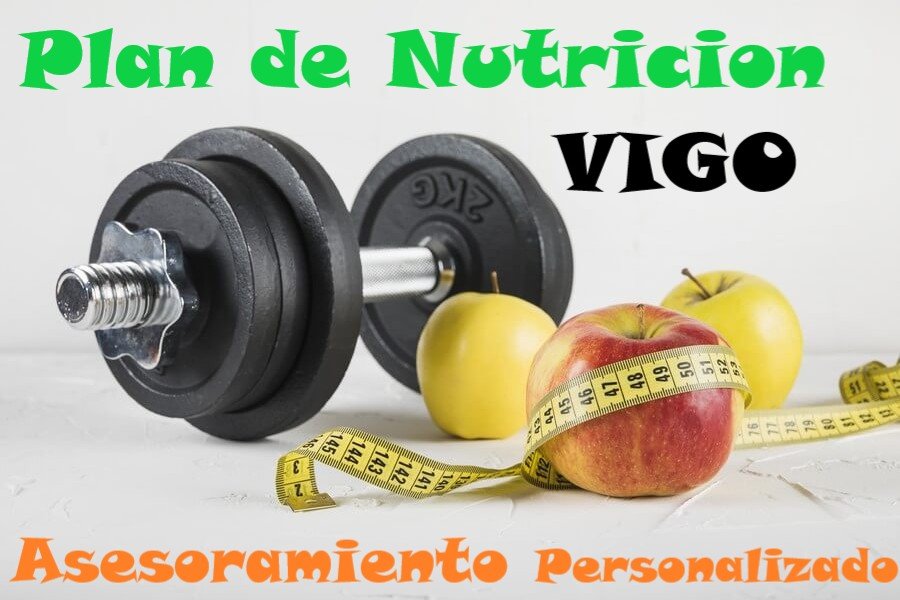 una mancuerna, tres manzanas y una cinta métrica